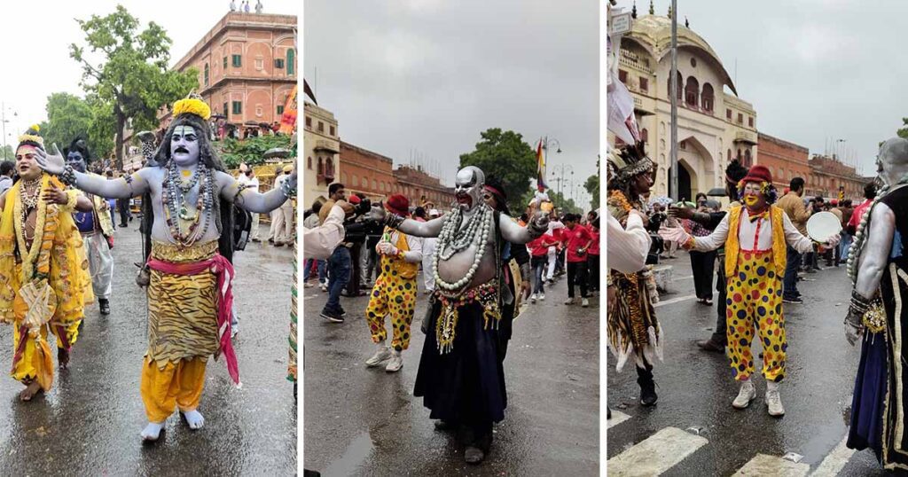Behrupiya artists performing at the Teej Festival in Jaipur, dressed as mythological and traditional characters, engaging with the crowd during the cultural celebration.