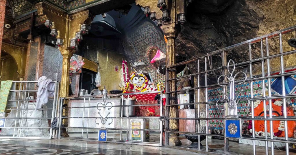 Bijasan Mata idol inside a sacred cave at Bijasan Mata Temple, Indergarh – a revered Hindu shrine in Rajasthan. The beautifully adorned idol of Goddess Bijasan is worshipped by devotees seeking divine blessings, protection, and spiritual peace in this serene, natural cave temple.