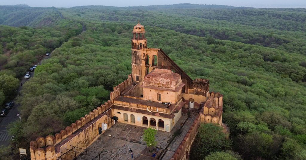 Drone view of showcasing its fort-like architecture amid the Aravalli hills