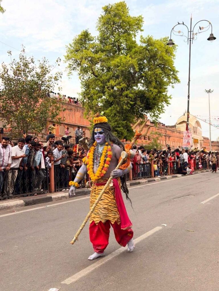 Behrupiya folk artist dressed as Lord Shiva performing during the Teej Festival in Jaipur