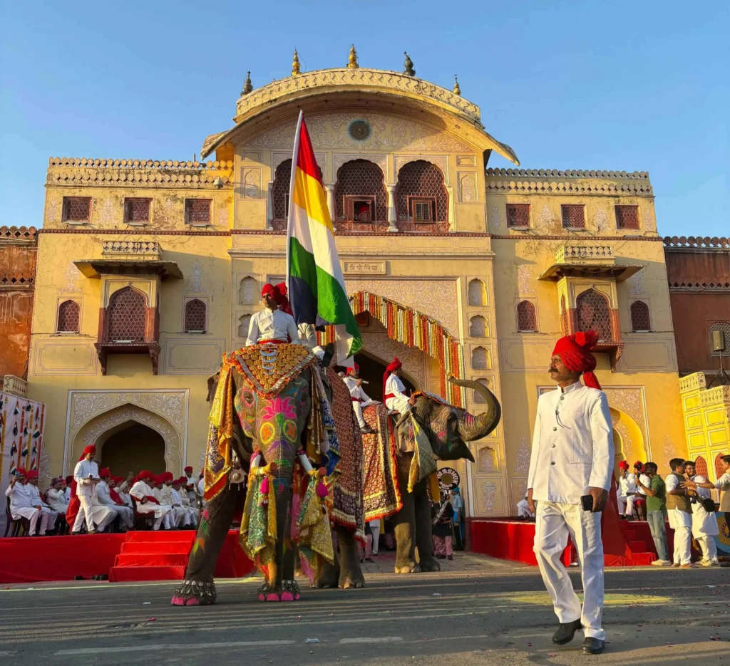 Decorated elephant carrying the Pachranga flag during the Teej procession in Jaipur